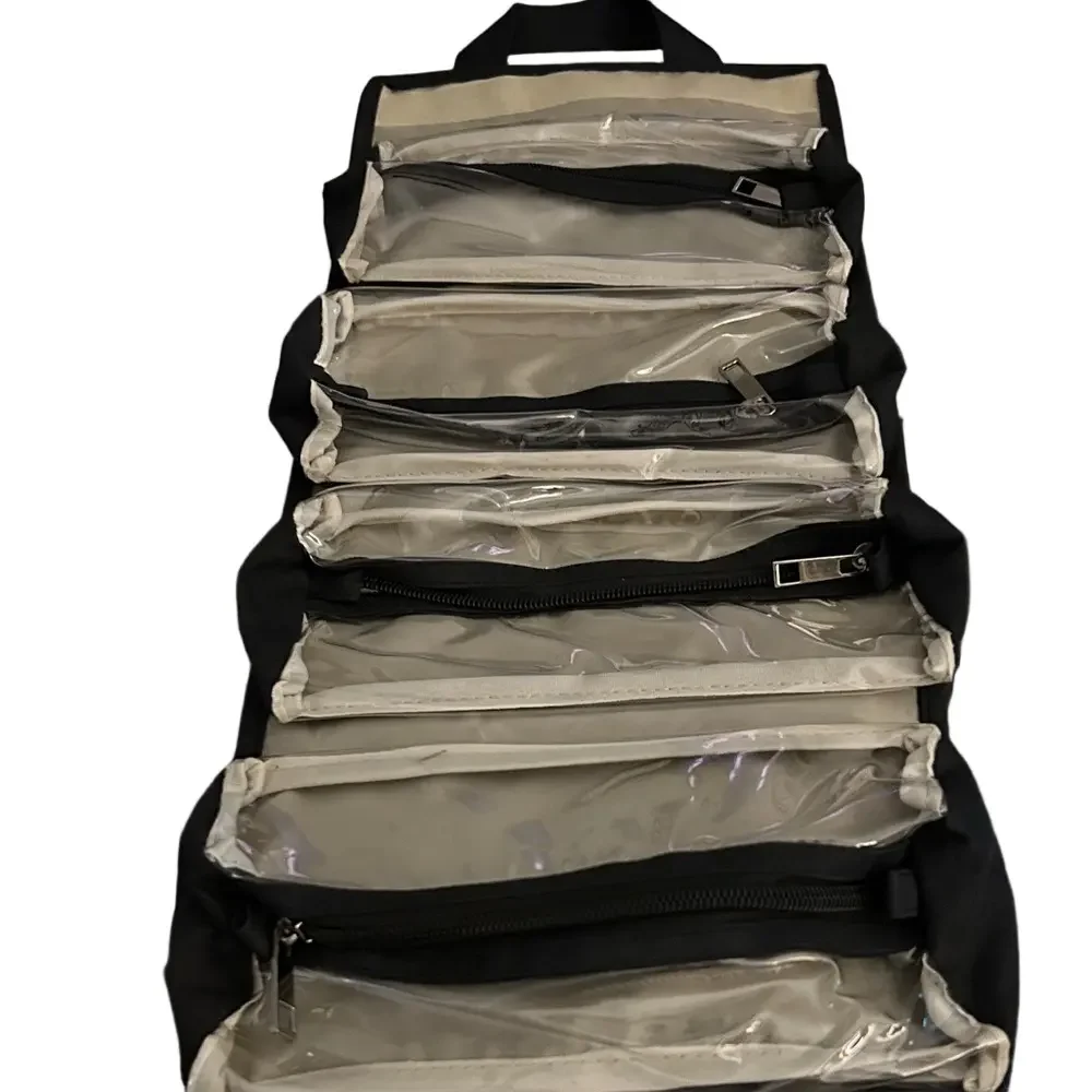 Black Multi-Compartment travel Bag in excellent condition- clean like new.